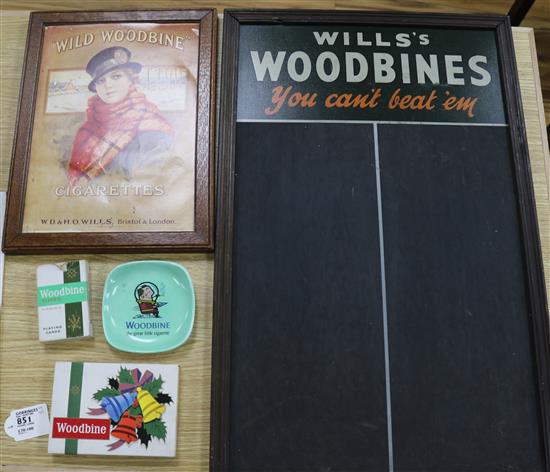 A Wills Woodbine tin advertising sign converted to a darts board and four other related items
